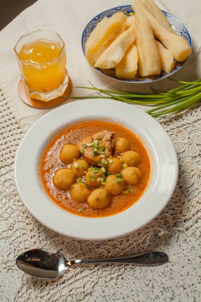 pexels photo 27397338 Delicious traditional Paraguayan soup with cassava served on a lace cloth.